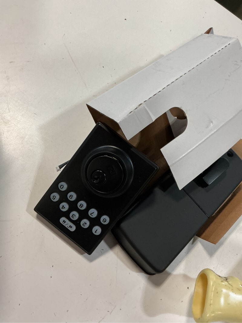 Condition photo showing As Is for reliabilt electronic keypad deadbolt door lock 5059217 matte black new