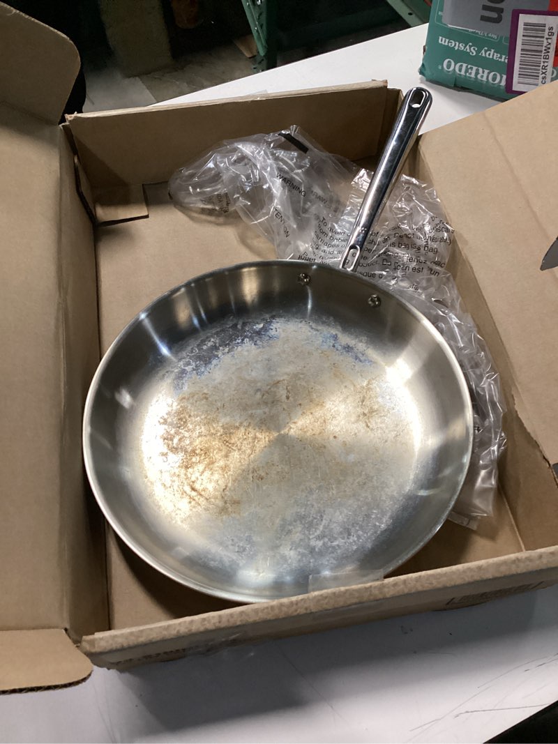 Condition photo showing As Is for WINCO Tri-Ply Frying Pan, Silver 7" Natural Finish