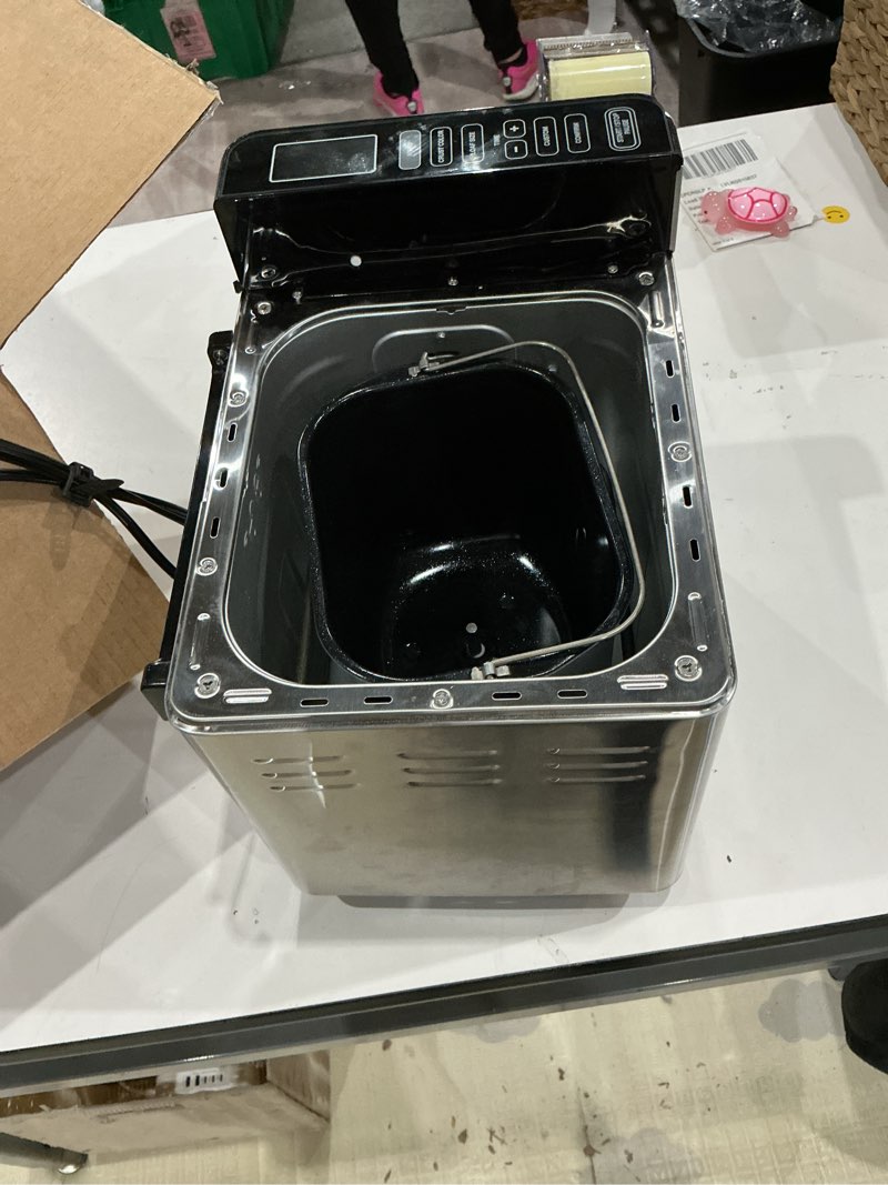 Condition photo showing As Is for cuisinart bread maker machine, stainless steel convection bread machine with 16 menu options, 3 loaf sizes up to 2 lb., 3 crust colors, includes measuring cup, spoon & kneading hook, cbk-210 convection machine
