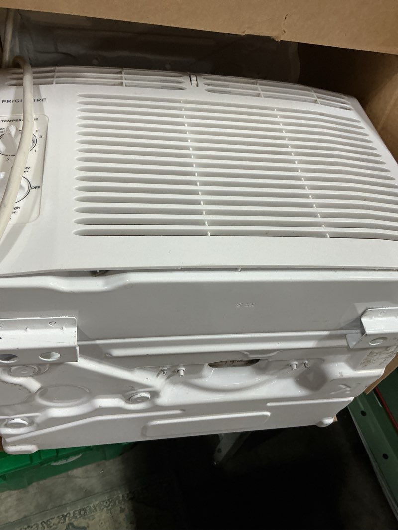 Condition photo showing Good Condition for frigidaire 5,000 btu window-mounted air conditioner, cools up to 150 sq. ft., quiet operation, effortless temperature control, 2 fan speeds, auto restart, white 5,000 btu mechanical controls