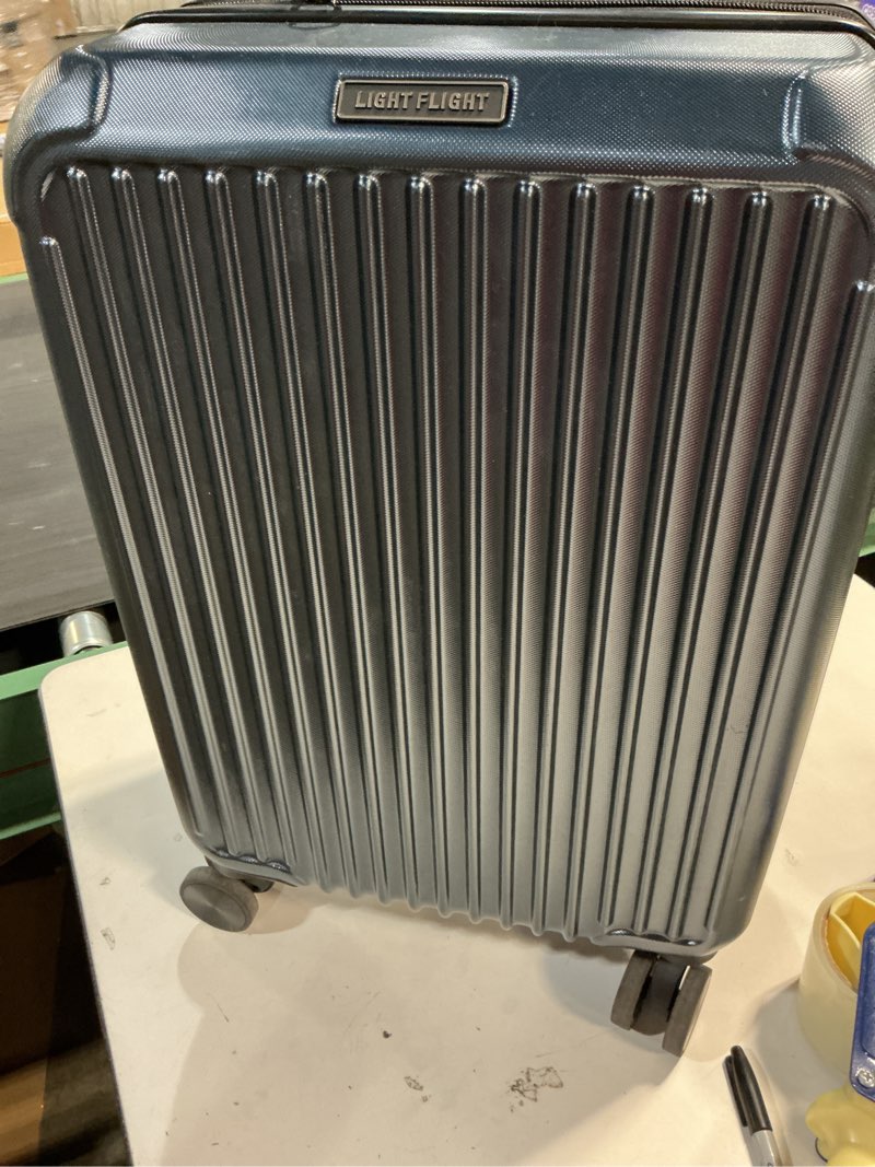 Condition photo showing As Is for miami carryon ocean hardside spinner carry on suitcase - navy blue