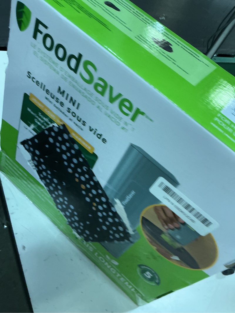 Condition photo showing New/Like New for foodsaver mini handheld vacuum sealer machine with marinate setting & charging dock, cordless food vacuum sealer for freezer, storage, sous vide, meal prep, blue
