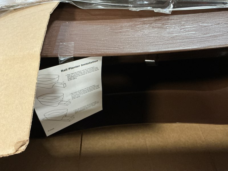 Condition photo showing Good Condition for emsco group bloomers railing planter with drainage holes – 24" weatherproof resin planter – brown, plastic brown 24.3 × 10.5 × 9.5 inches