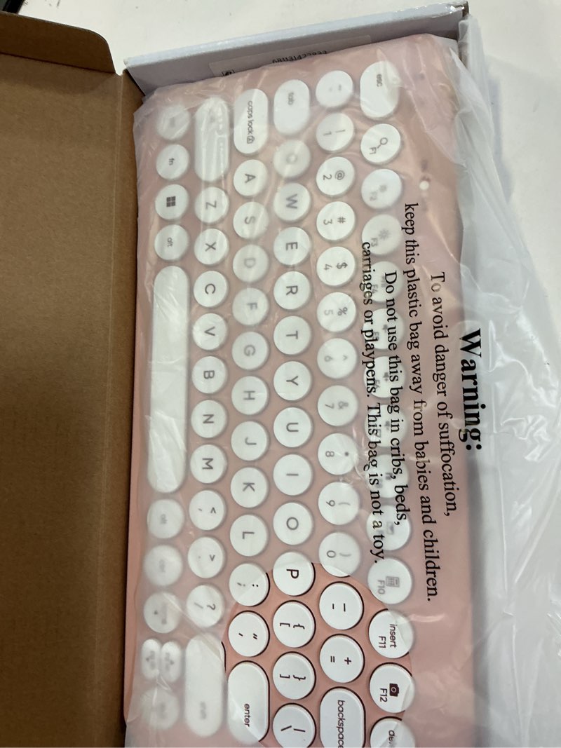Condition photo showing Good Condition for onn mini wireless office keyboard with usb receiver, pearl blush pink
