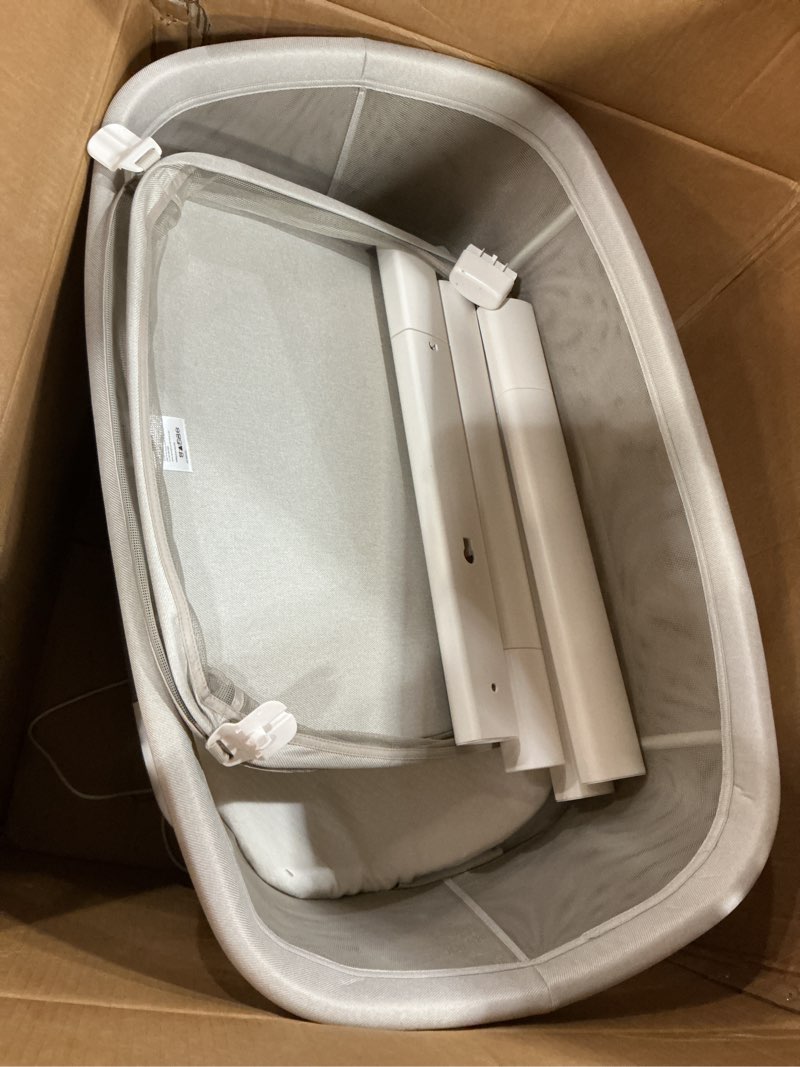 Condition photo showing As Is for UPPAbaby Soma Smart Bassinet – 5 motions + 5 speeds + 4 Sounds with MotionSync Technology – Height Adjustable – Included Mattress, Sheet + Storage Basket – Charlie (Sand Mélange)
