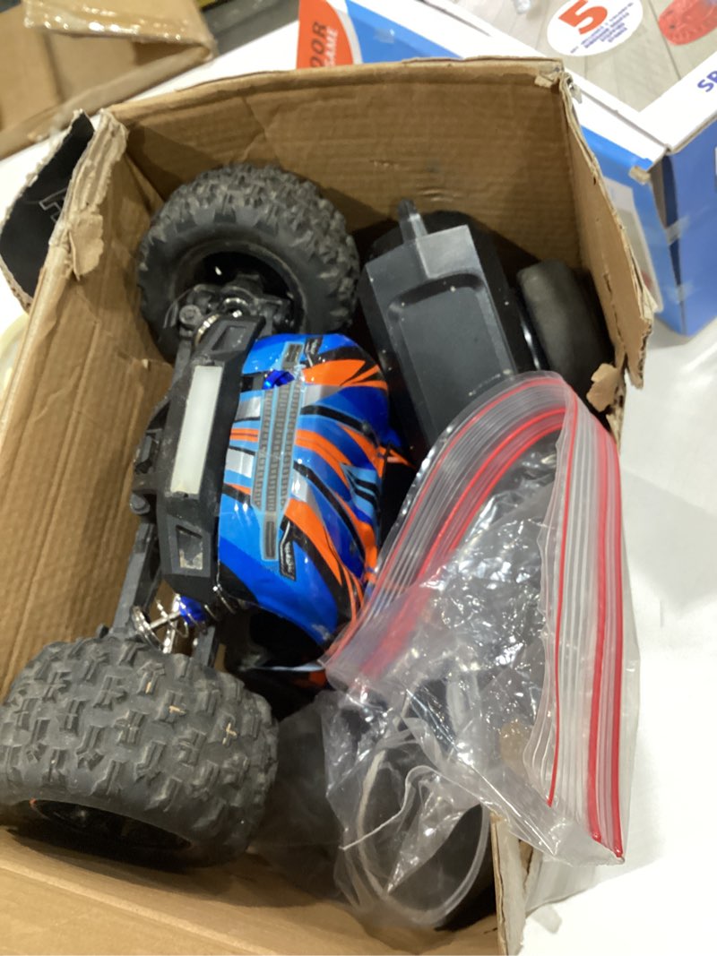 Condition photo showing As Is for HYPER GO H16DR 1:16 Scale Ready to Run Fast Remote Control Car, High Speed Jump RC Monster Truck, Off Road RC Cars, 4WD All Terrain RTR RC Truck with 2 LiPo Batteries for Boys and Adults