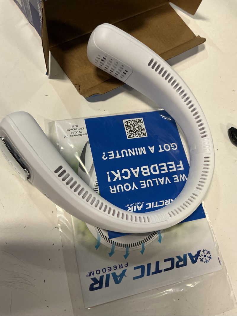 Condition photo showing As Is for arctic air freedom neck cooler, portable neck fan with 3 fan speeds, usb charging, 6-hour battery