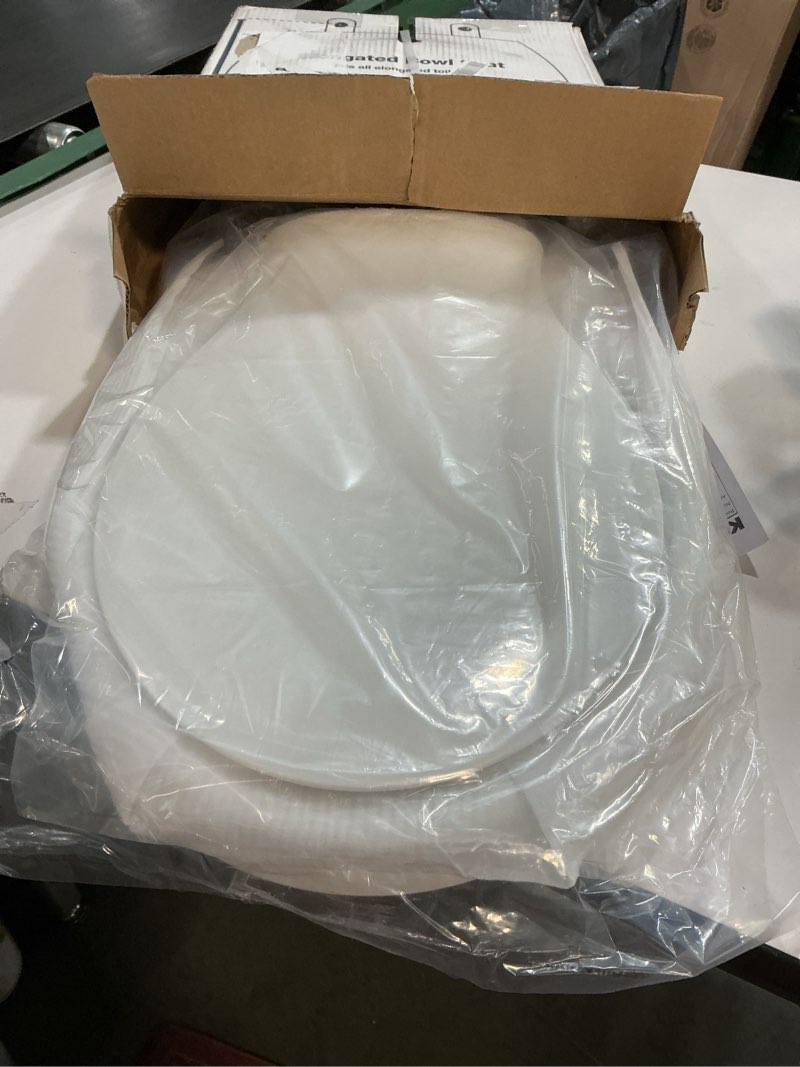 Condition photo showing Good Condition for KOHLER K4732-RL-0 Transitions Elongated Toilet Seat Closed-Front with Integrated Child-Size Seat, Quiet-Close, and Grip-Tight Bumpers, White White Ready Latch