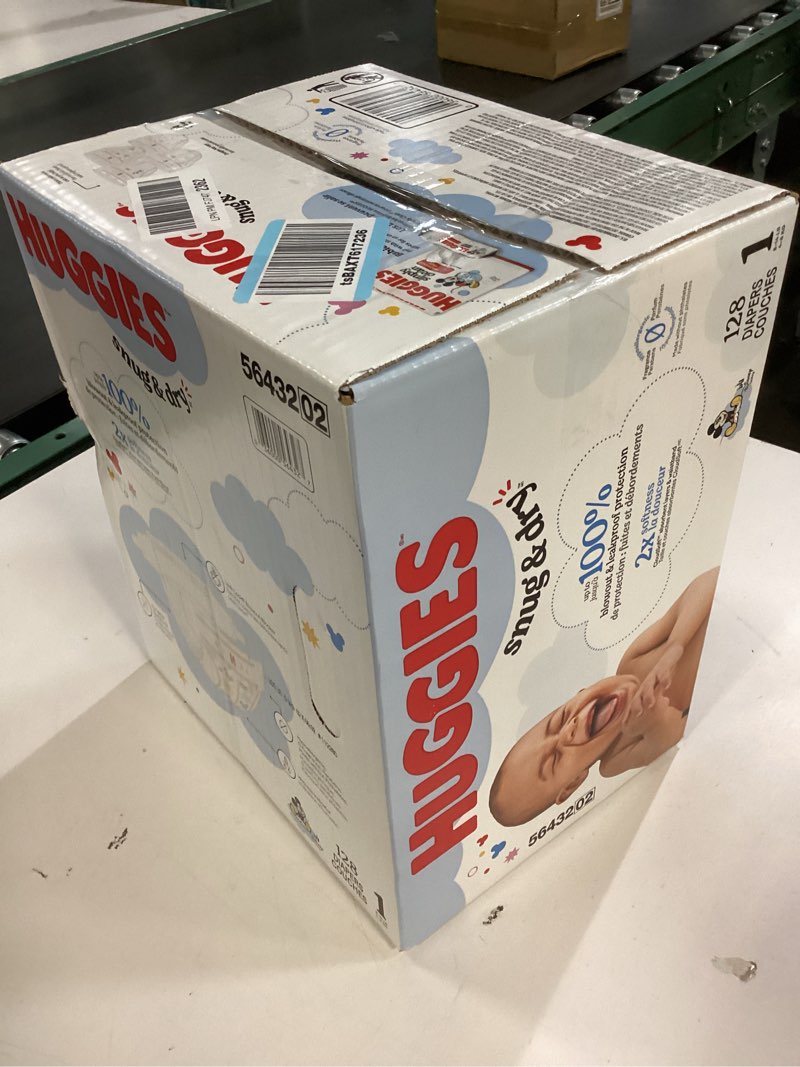 Condition photo showing New/Like New for Huggies Size 1 Diapers, Snug & Dry Newborn Diapers, Size 1 (8-14 lbs), 128 Count, Packaging May Vary
