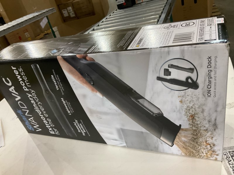 Condition photo showing New/Like New for Shark WANDVAC Cordless Hand Vac, Lightweight, Versatile and Portable at 1.4 lbs., Powerful Suction for Pet Hair, Charging Dock, One-Touch Empty for Car & Home, Duster Crevice Tool, Black, WV201BK