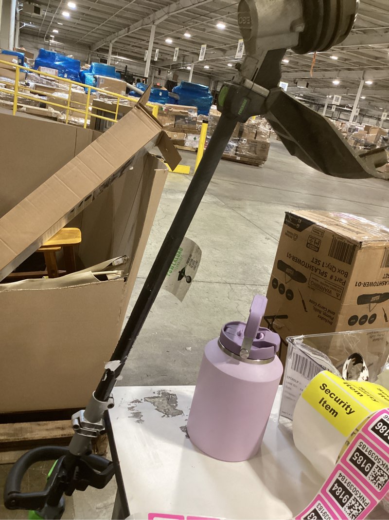 Condition photo showing As Is for ego power+ powerload with carbon fiber shaft 56-volt 16-in telescopic shaft battery string trimmer