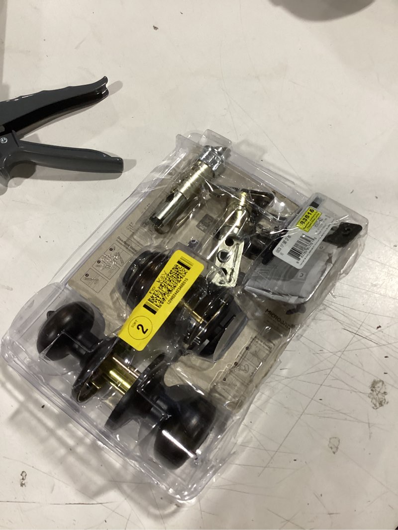Condition photo showing Good Condition for kwikset smartkey security cove venetian bronze deadbolt and entry door knob kw1 2-3/4 in.