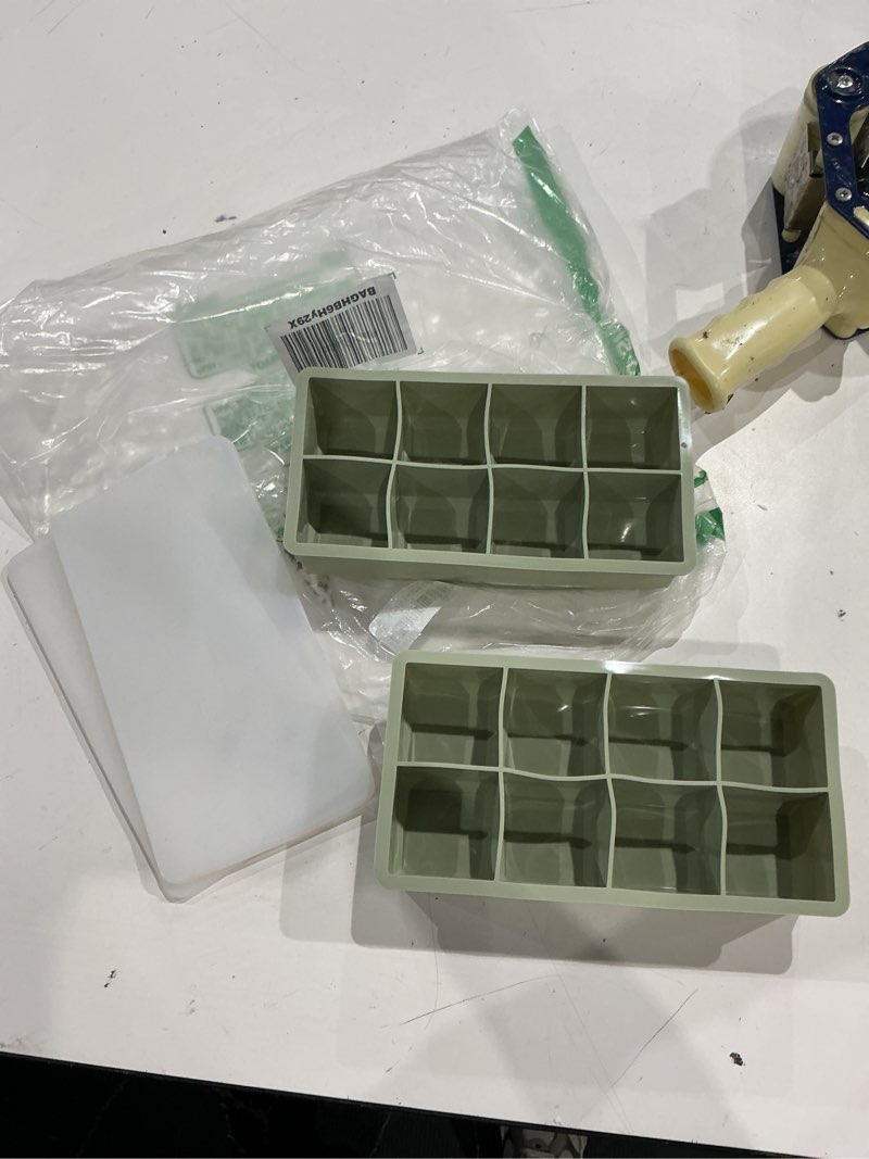 Condition photo showing Good Condition for 1/2 cup silicone freezer tray with lid - silicone freezer molds 2-pack for meal prep & freezing of various sauces and other dishes, makes 16 perfect 1/2 cup portions cube?green 2 pack?