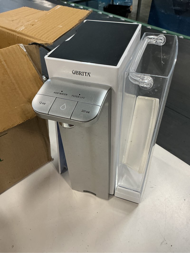 Condition photo showing As Is for brita hub instant powerful countertop water filter system, 12 cup water reservoir, includes 6 month carbon block filter, white, 87340