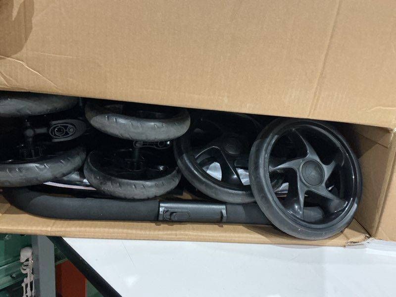 Condition photo showing As Is for jeep destination ultralight side x side double stroller, midnight