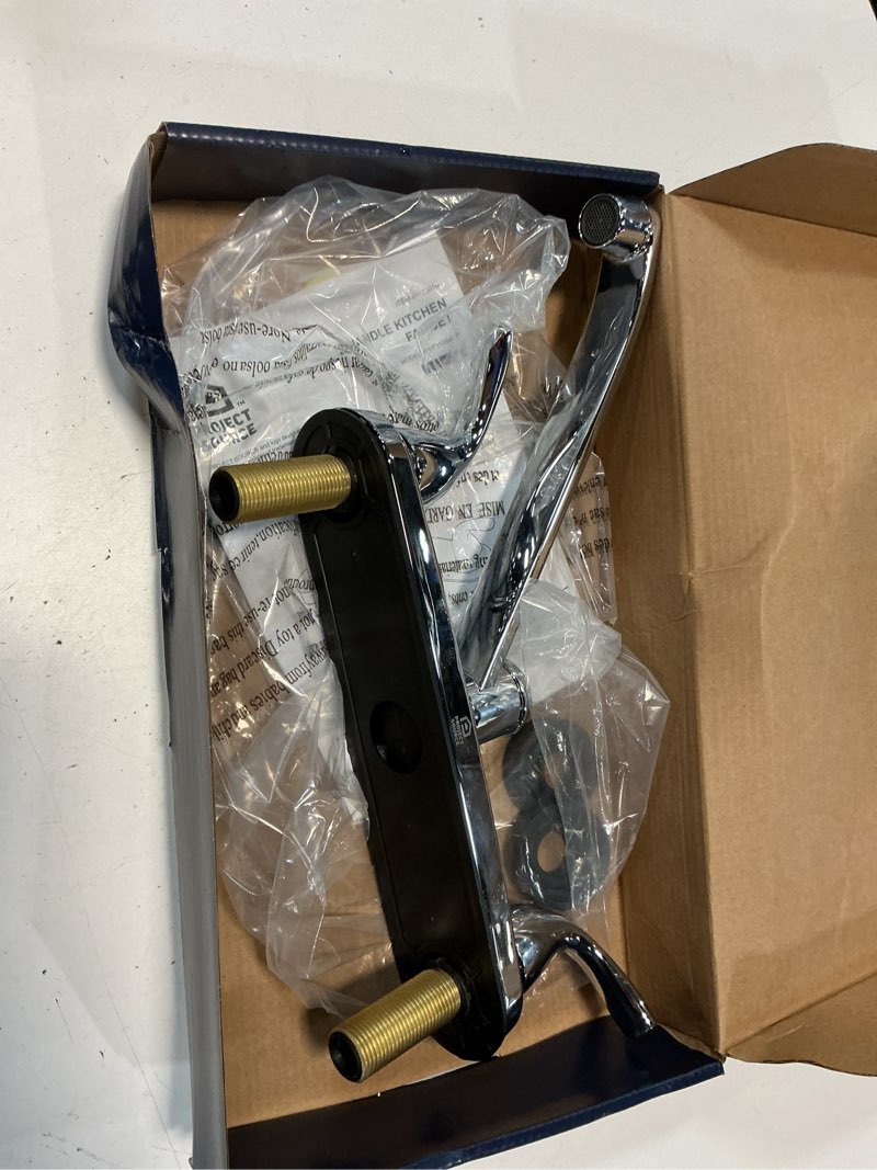 Condition photo showing As Is for project source dover chrome double handle deck-mount kitchen faucet (includes deck plate)