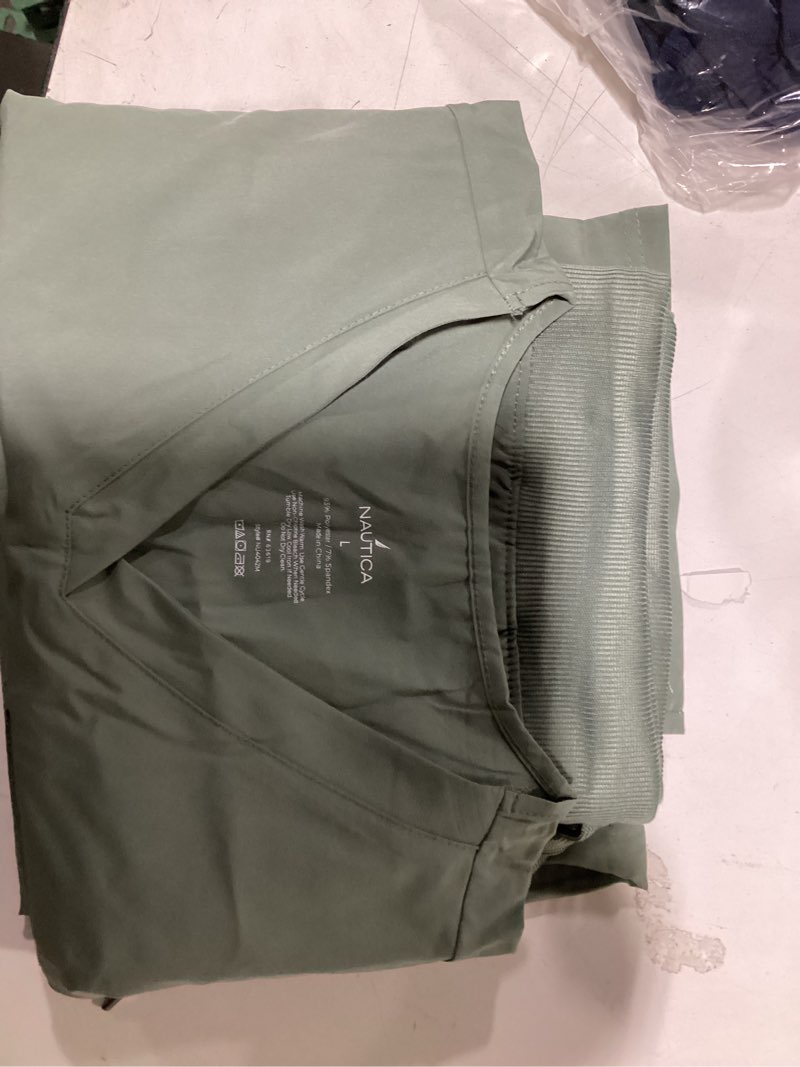 Condition photo showing New/Like New for Nautica Women's Scrub Set, 9-Pocket Breathable & Stretchy Pants & Tops Olive Large
