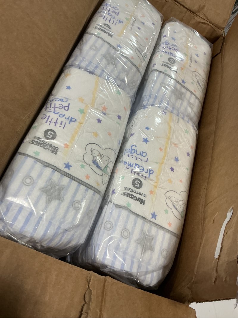 Condition photo showing New/Like New for huggies size 5 overnites baby diapers: overnight diapers, size 5 (27+ lbs), 88 ct, packaging may vary