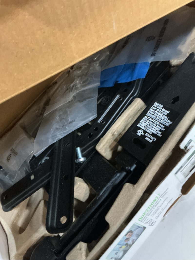 Condition photo showing As Is for sanus vuepoint full-motion tv wall mount for tvs 26"-65" up to 55 lbs – height adjust with swivels, tilts, and extends up to 19" from the wall