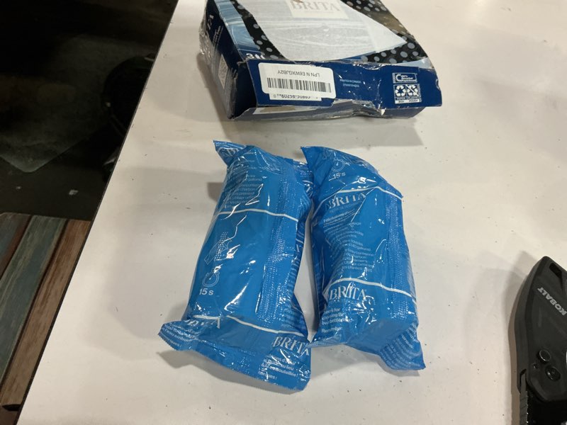 Condition photo showing As Is for brita plus water filter, bpa-free, high-density replacement filter for pitchers and dispensers, reduces 2x contaminants*, lasts two months or 40 gallons, includes 3 filters 3 count