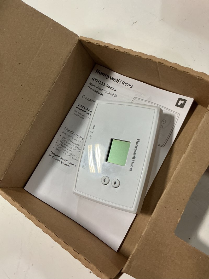 Condition photo showing As Is for horizontal non-programmable thermostat
