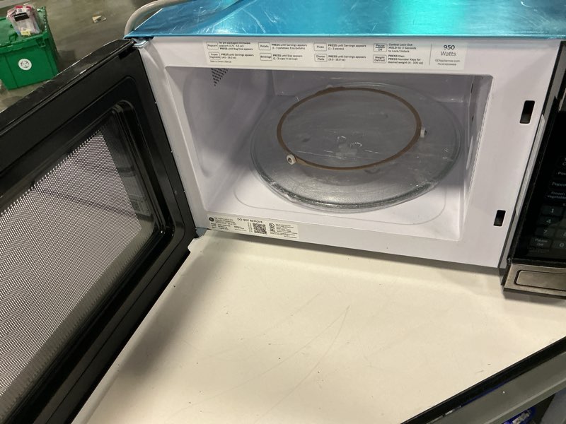 Condition photo showing As Is for GE JES1145SHSS 1.1 Cu. Ft. Capacity Countertop Microwave Oven