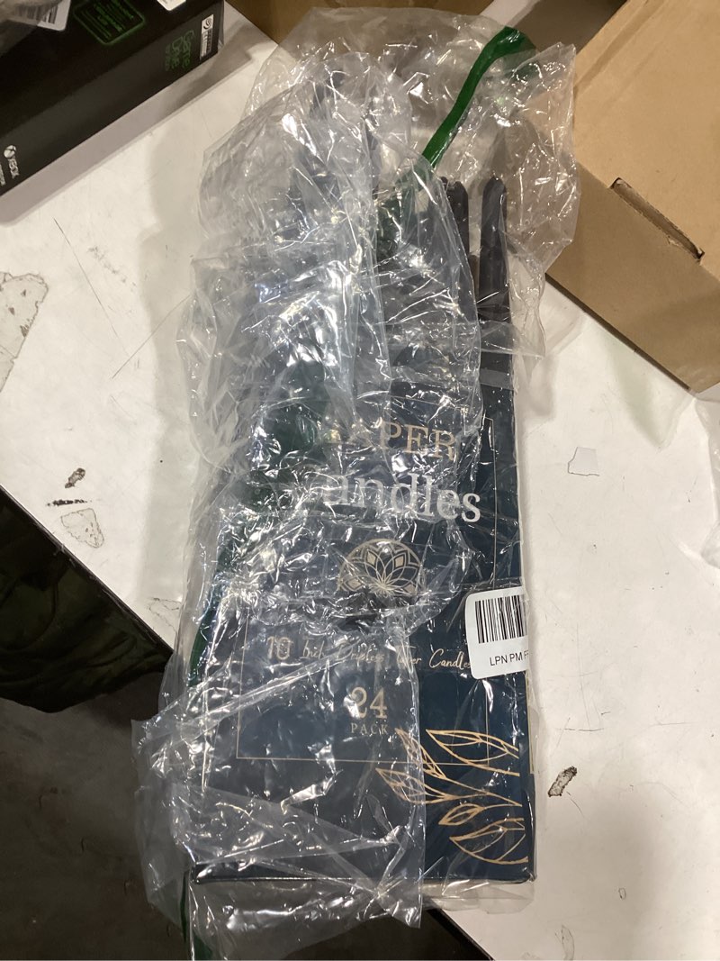 Condition photo showing As Is for 24 Pack Black Taper Candles, 7-8 Hours Burn Time, Unscented, Smokeless and Dripless, 0.75 x 10 Inch Dinner Candle Set for Halloween, Household, Wedding, Party and Home Décor Candlesticks