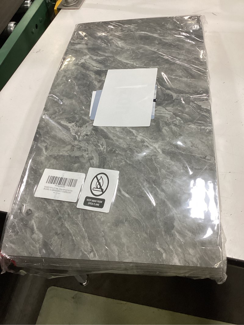 Condition photo showing New/Like New for wadile 23.6\"x11.8\" waterproof marble peel and stick wall panels marble tile pvc backsplash tiles for kitchen, bathroom, living room, bedroom 20 pack dark grey 20 pack dark gray