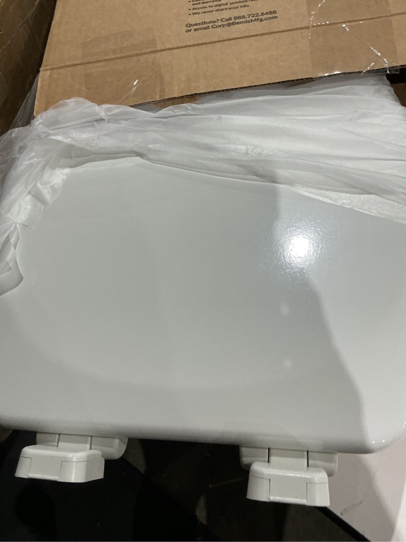 Condition photo showing Good Condition for american standard telescoping white elongated slow-close toilet seat