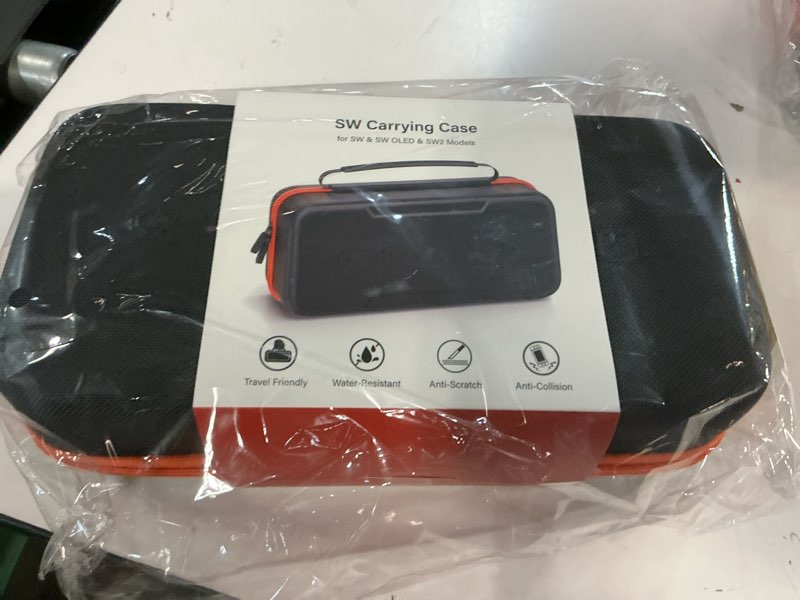 Condition photo showing New/Like New for switch 2 carrying case charge inside compatible with nintendo switch 2 (2025)/ original/ oled, travel carrying case with slots for joycon 2 & ac adapter, hard shell protective bag for 26 games orange