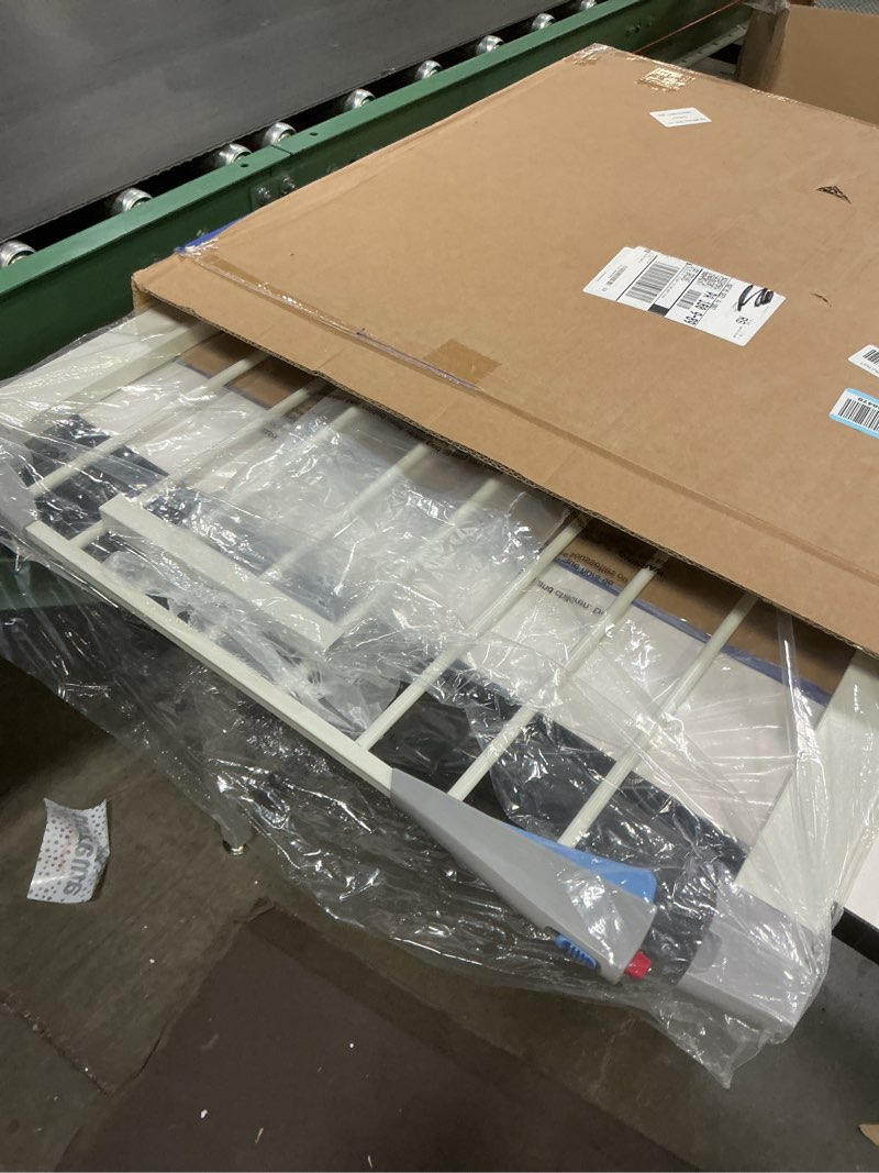 Condition photo showing Good Condition for Amazon Basics Adjustable Wide Walk Through Metal Pet Gate, 28.3 x 1 x 30 inches, White and Grey