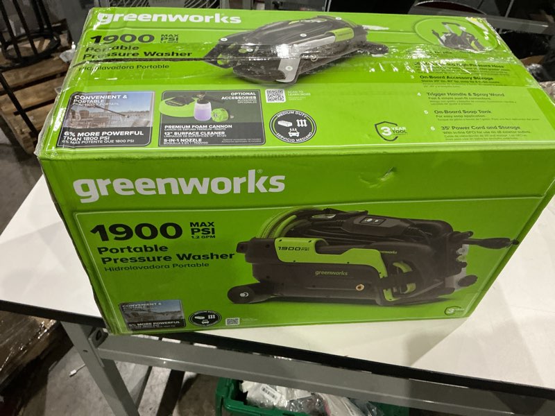 Condition photo showing As Is for greenworks green portable pressure washer