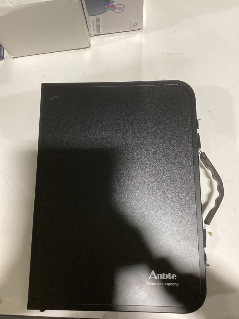 Condition photo showing New/Like New for Anbte Folding Camping Table with Storage Net, Pure Black Aluminum 2ft Picnic Table 23.2" x 16" Outdoor Table Adjustable Height Max 27.5", Lightweight, Waterproof, Portable Handle for Travel Cooking Pure Black 24"L x 16"W x 27.5H"