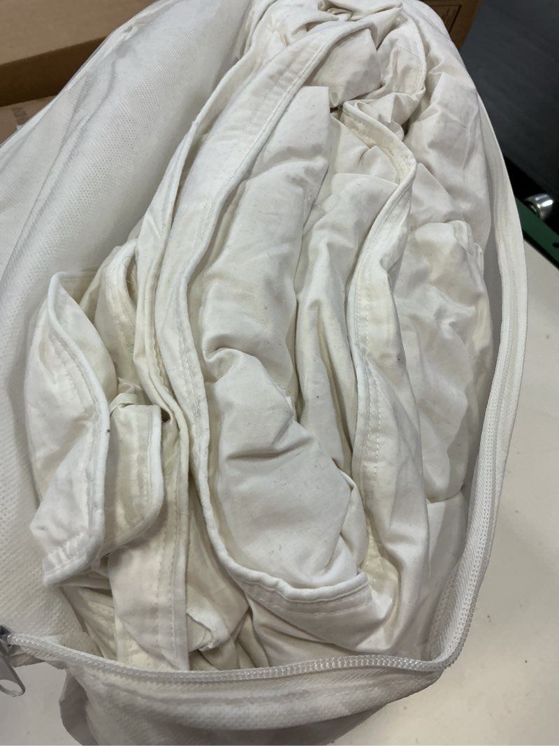 Condition photo showing As Is for lightweight premium down comforter, twin, down