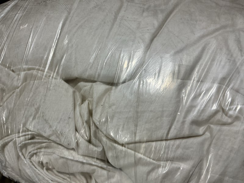 Condition photo showing As Is for comforter, twin