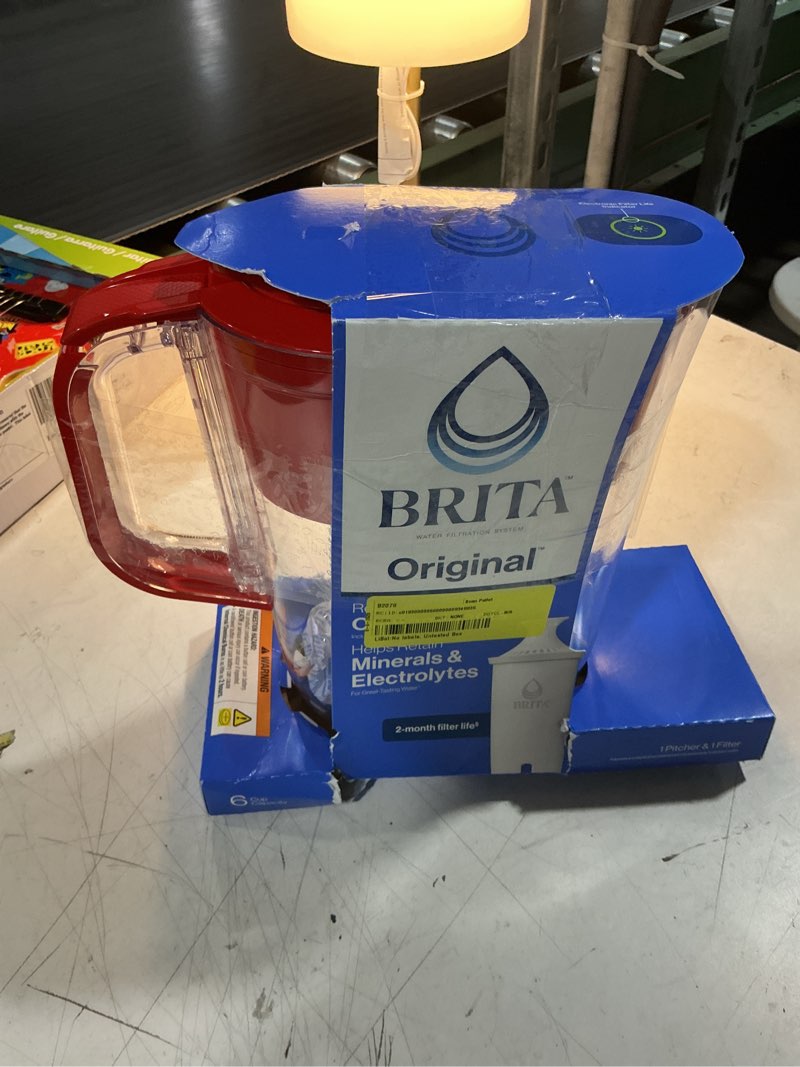 Condition photo showing As Is for brita small 6 cup red denali water filter pitcher with 1 brita standard filter