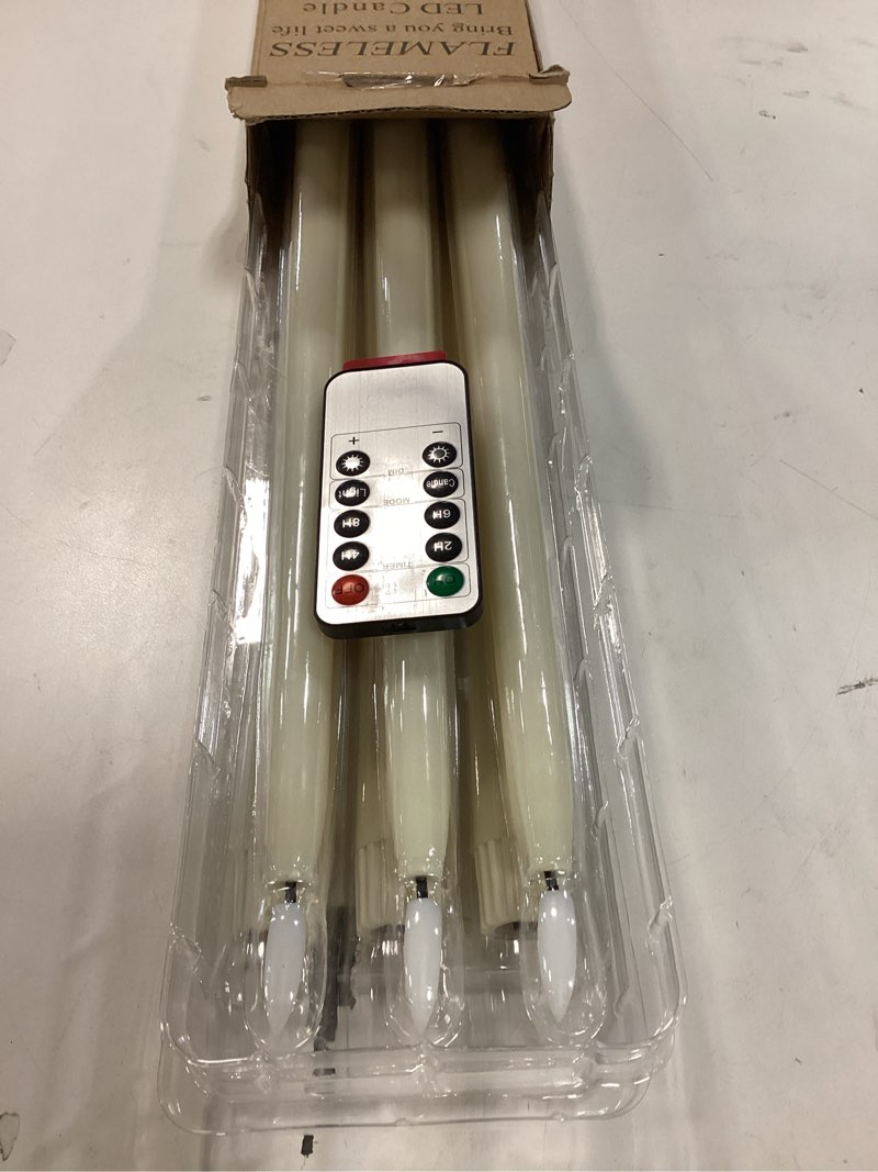 Condition photo showing New/Like New for Homemory 15 inches Real Wax Flameless Taper Candles with Remote Timer, 6 Pcs Ivory LED Taper Candles Battery Operated with 3D Flickering Flame, Window Candle Led Candlesticks for Dinners Home Decor