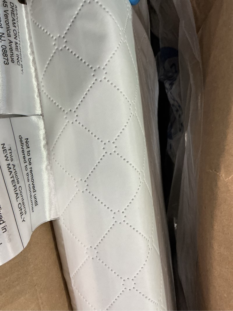 Condition photo showing Good Condition for Dream On Me Portable Crib and Toddler Mattresses - White