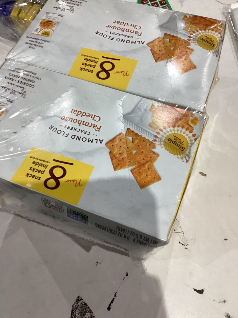 Condition photo showing As Is for Simple Mills Almond Flour Crackers Snack Packs, Farmhouse Cheddar, Gluten Free, Flax Seed, Sunflower Seeds, Corn Free, Good for Snacks, 6.5 oz, Pack of 2 (8 Bags per Box) Farmhouse Cheddar 6.5 Ounce (Pack of 2)