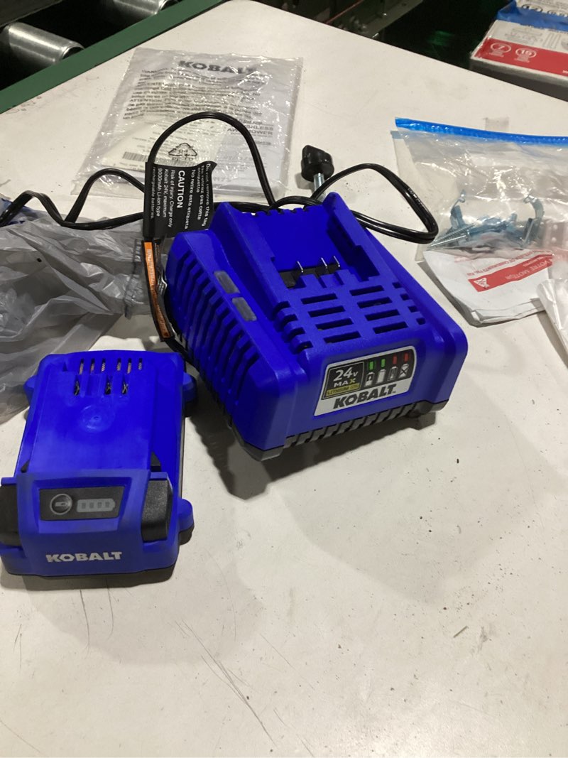 Condition photo showing As Is for kobalt 24v max 2-pack 2 ah lithium battery kit charger included