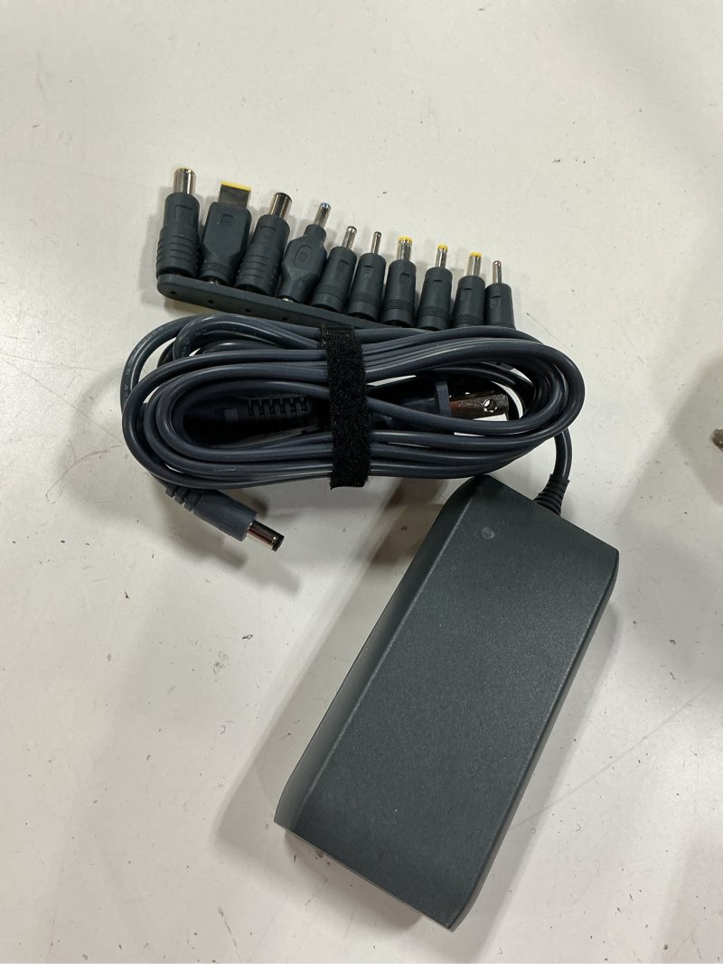 Condition photo showing As Is for onn 90w laptop charger with 10 interchangeable tips, 10ft power cord, for hp, dell, lenovo, grey