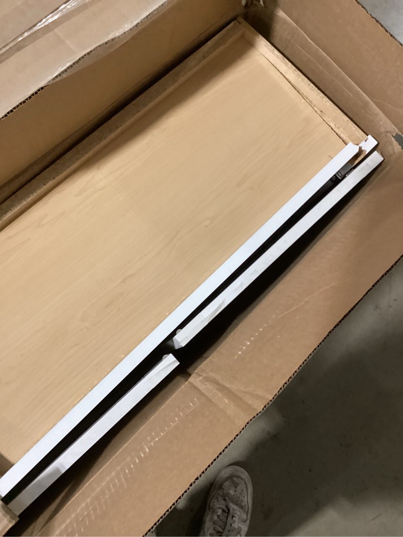 Condition photo showing As Is for courtland 36 in. w x 12 in. d x 15 in. h assembled shaker wall bridge kitchen cabinet in polar white