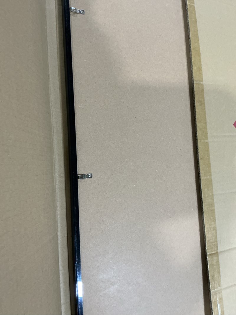 Condition photo showing As Is for lavie home 22.375x34 picture frame for wall display, 22.375x34 black picture frame with hd plexiglas, 22.375 x 34 frame 1 pack, display frame for vertical or horizontal, classic collection black 22.375x34 1