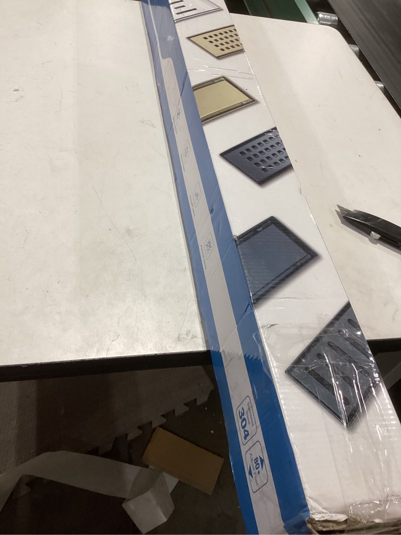 Condition photo showing Good Condition for SaniteModar Linear Shower Drain, High Flow Rate Shower Drain 48 inch Removable Grate, Brushed 304 Stainless Steel Linear Floor Drain with Hair Strainer and Leveling Feet