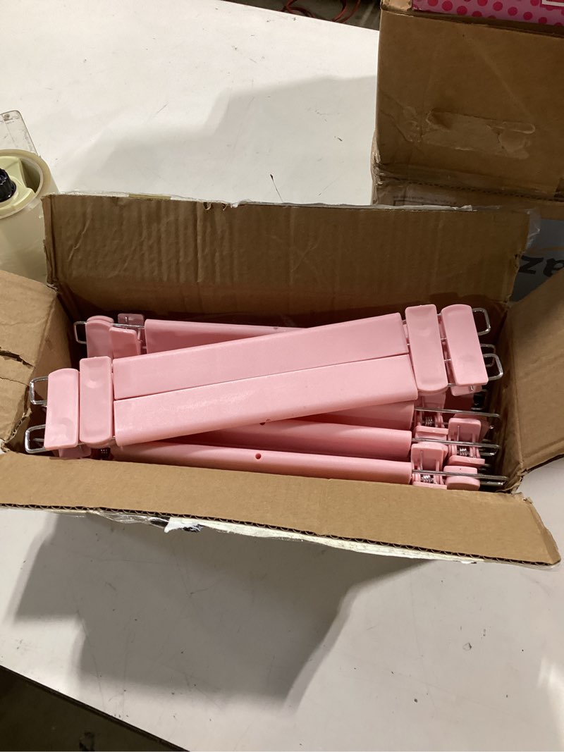 Condition photo showing Good Condition for pants hangers with clips, skirt hangers, 20 pack, pink | plastic clip hangers for pants, skirts, jeans and shorts; 360° swivel hooks help save closet space. pink 20pack