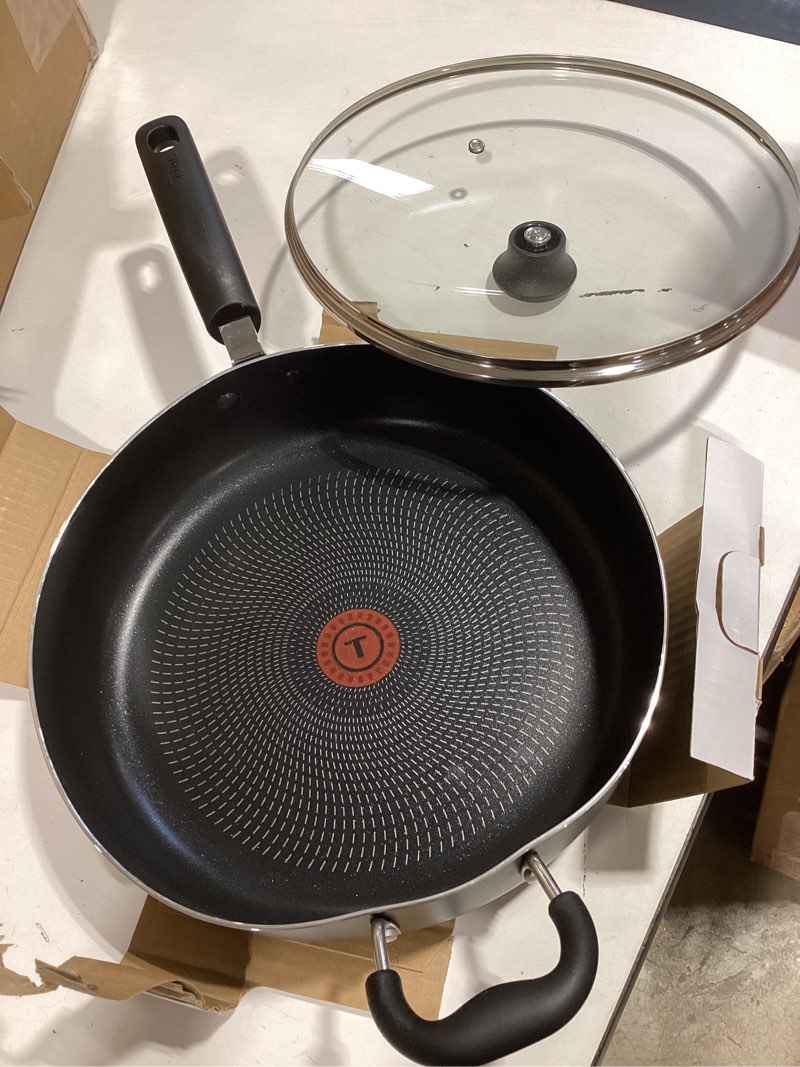 Condition photo showing As Is for t-fal specialty nonstick saute pan with glass lid 5 quart, oven broiler safe 350f, cookware, deep frying pan with handle, skillet, kitchen, pots and pans, dishwasher safe, black 5-quart nonstick black