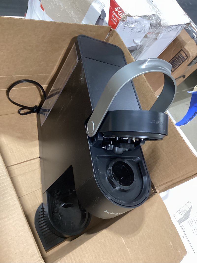 Condition photo showing As Is for keurig k-slim single serve k-cup pod coffee maker, multistream technology, 3 brew sizes, slim and sleek design, 46oz removable reservoir, black