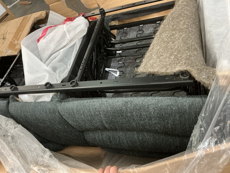 Condition photo showing As Is for Signature Design by Ashley Draycoll Contemporary Double Reclining Manual Loveseat with Center Console, Dark Gray