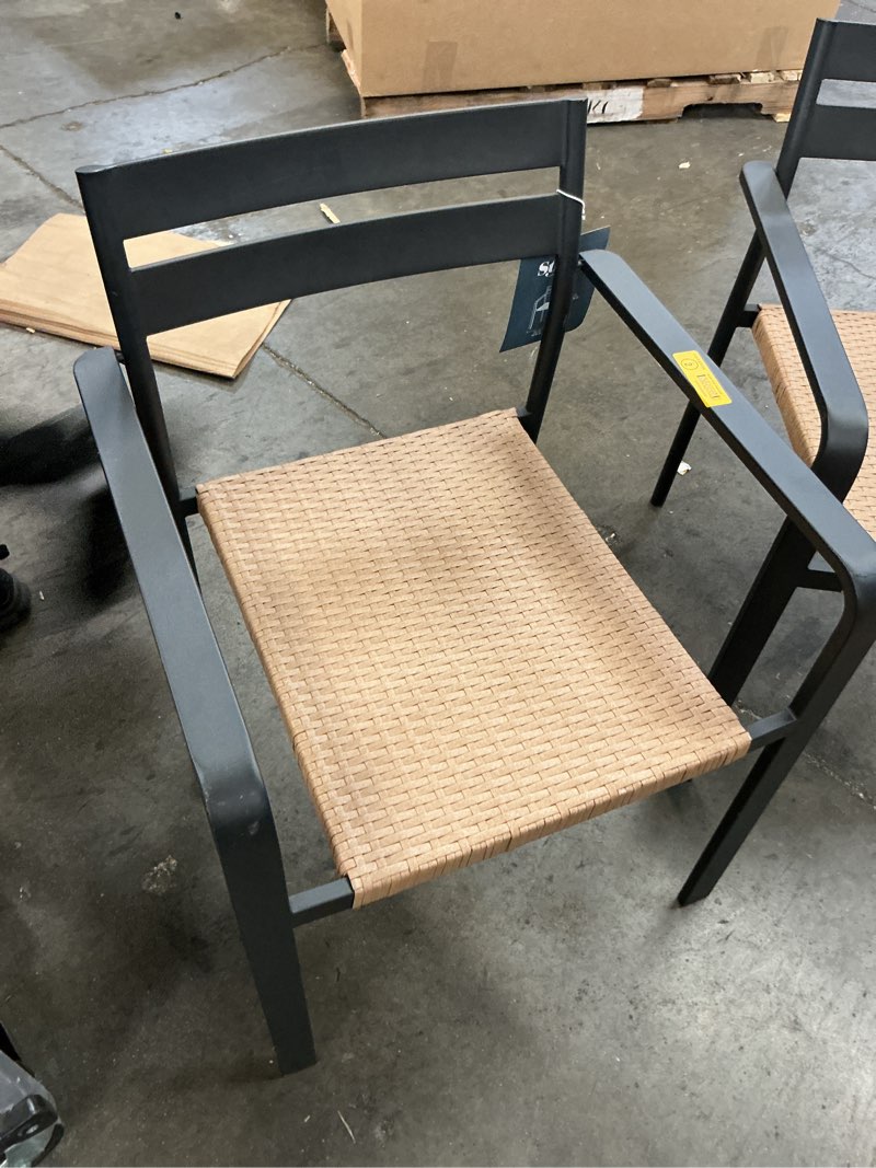 Condition photo showing As Is for  style selections darcy wicker stackable black steel frame stationary dining chair with woven seat item #6034664 | model