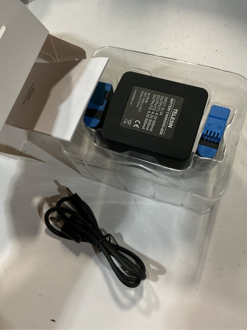 Condition photo showing New/Like New for telesin 2-pack batteries and 3-channel usb battery quick charger with type-c cord compatible with go